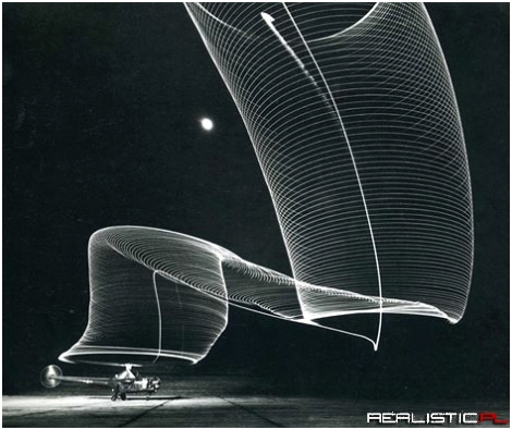 Exposure shot of a helicopter landing at night