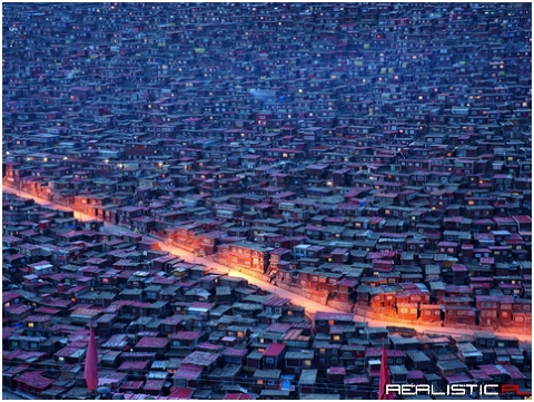 Street lights pop near small homes with red roofs in Larung Gar,