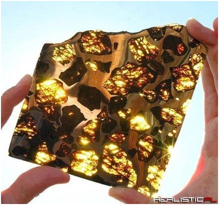 This is a piece of the Fukang meteorite, a 1,003 kilogram meteorite discovered near the Chinese city of Fukang