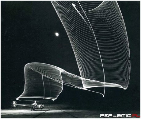 Exposure shot of a helicopter landing at night