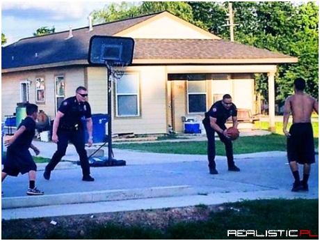 Police Officers Spare a Moment for a Quick Pick-Up Game