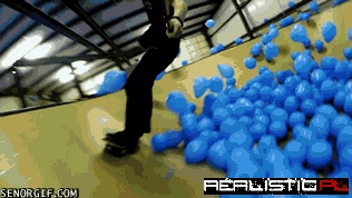 Skateboarding in a Pile of Balloons